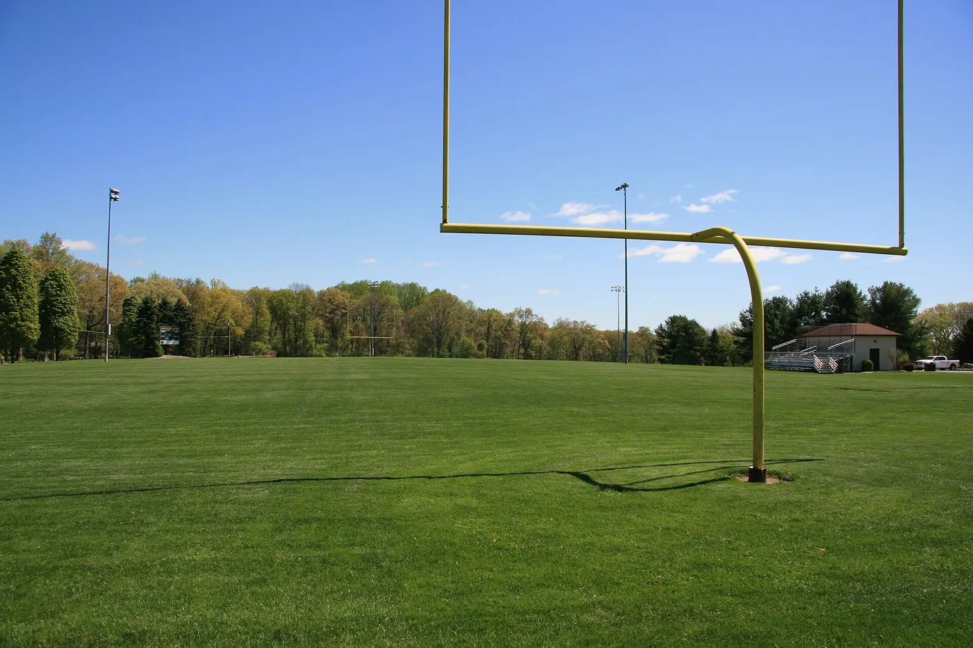 A football goalpost on an empty field. File photo, 2021.