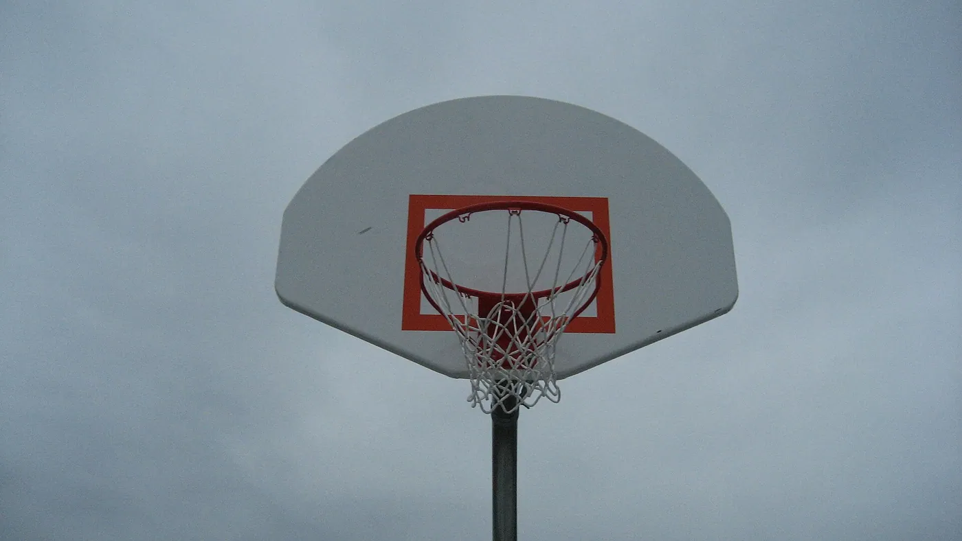 A basketball hoop under a grey sky. File photo.